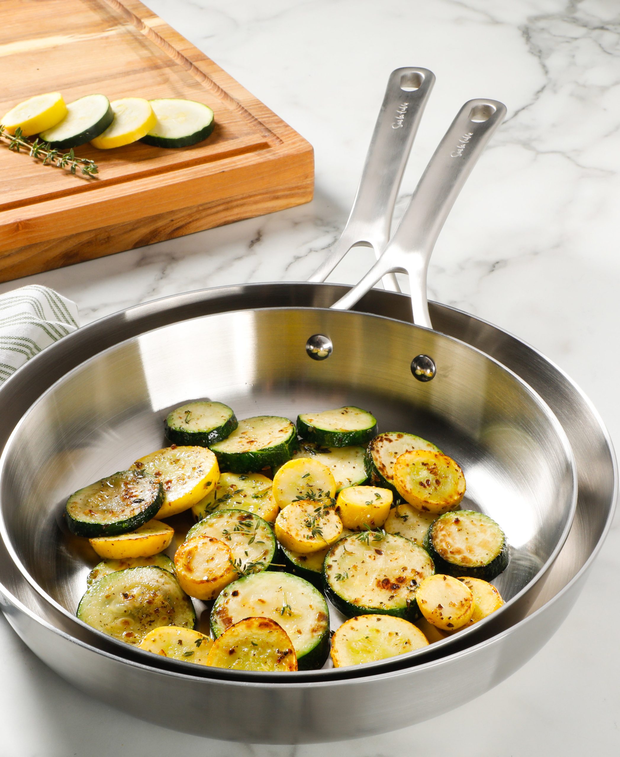 Sur La Table Pike and Pine 10-Piece Triply Stainless Steel Cookware Set w/ Stainless Steel Lids and Cast Handles - Image 3