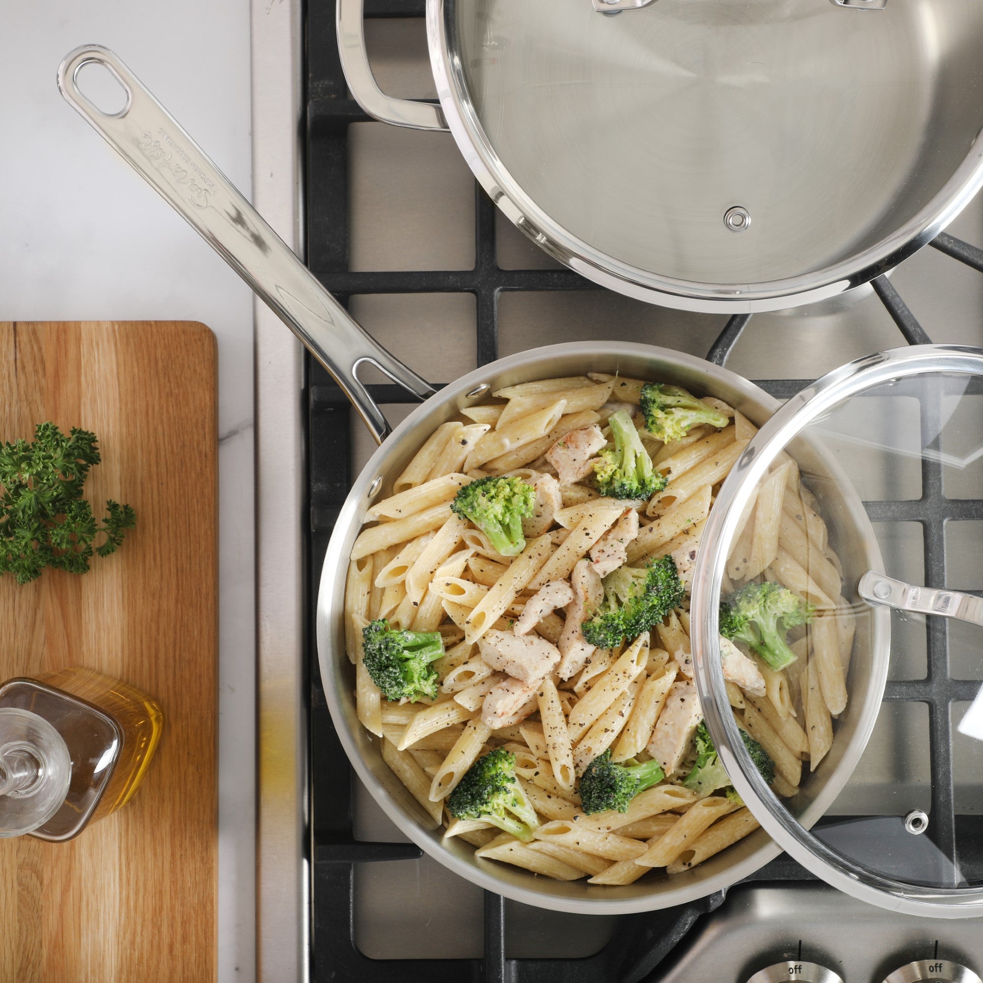Sur La Table Kitchen Essentials 10 Piece Stainless Steel Non Toxic Pots and Pans Kitchen Cookware Set W/ Triply Encapsulated Base - Induction Safe - Image 5