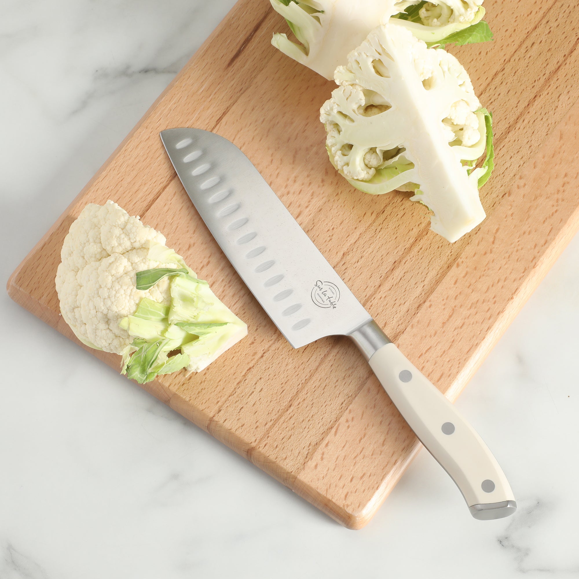 Sur La Table Kitchen Essentials Tasting Kitchen German Steel Santoku Knife, 7-Inch Stainless Steel Blade – Professional Kitchen Knife with White Handle and Forged Full Tang - Image 2