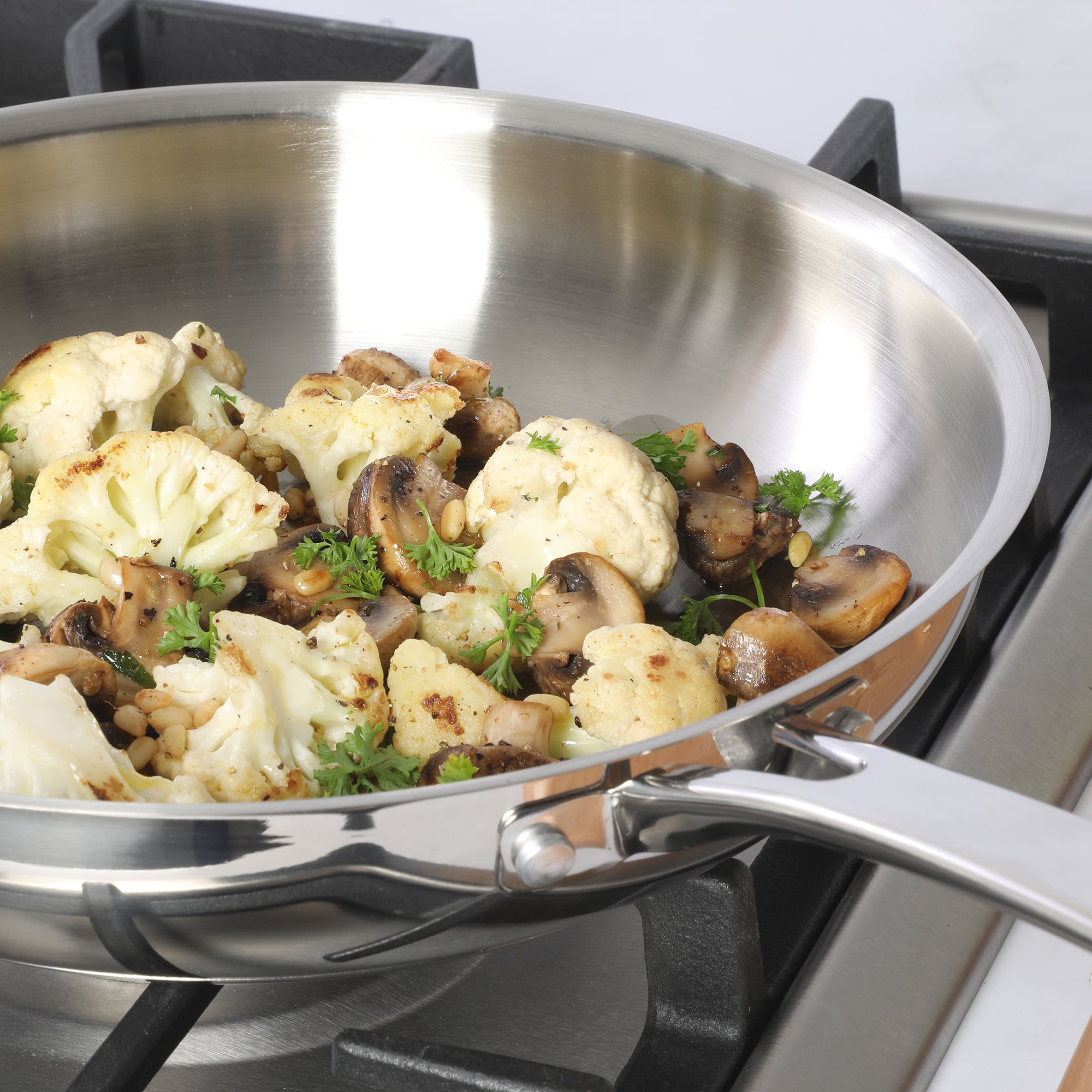 Sur La Table Kitchen Essentials Chef's Deck Stainless Steel Frying Pan – Induction Ready Skillet with Tri-Ply Base, Polished Finish & Hollow Stay-Cool Handle - Image 8