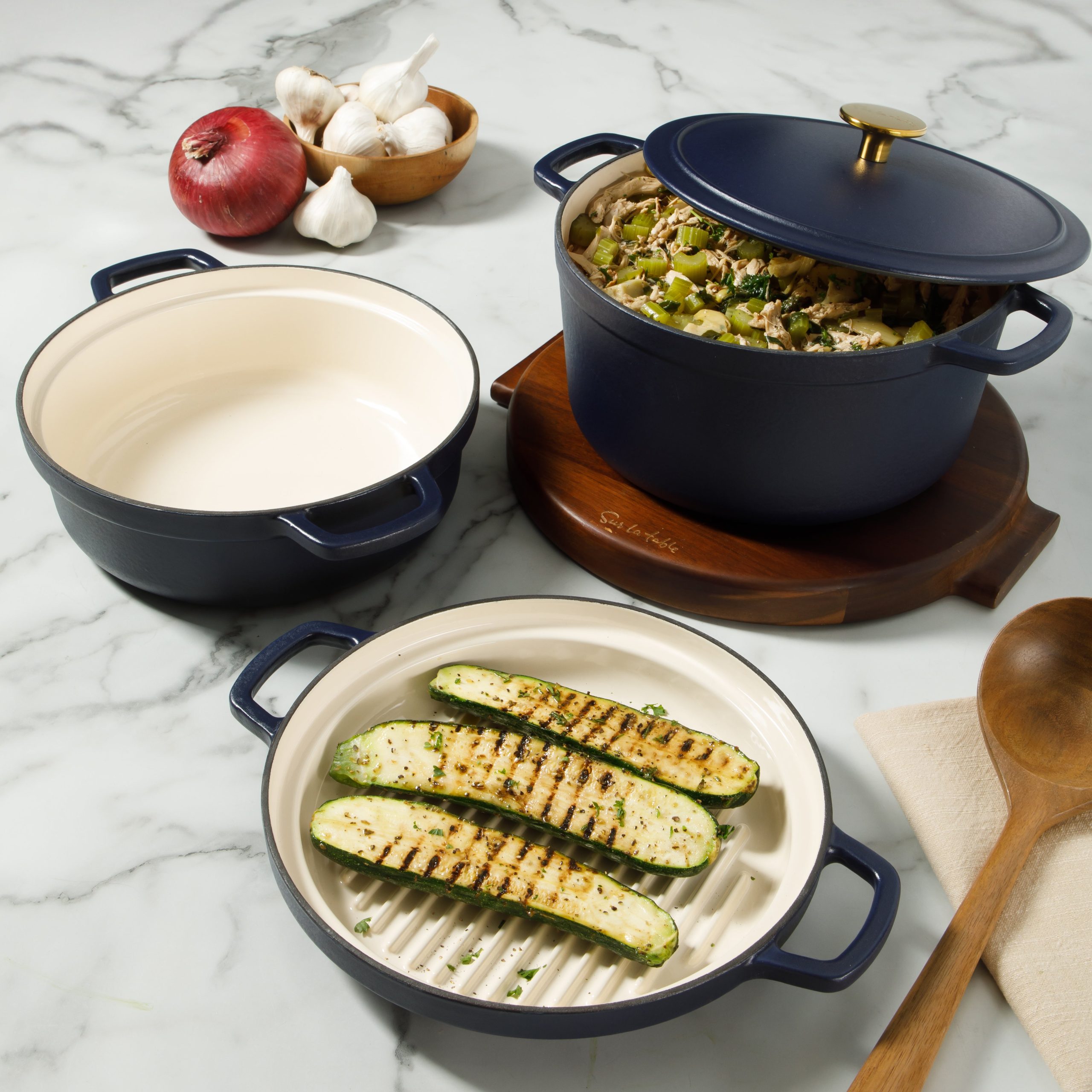 Sur La Table Kitchen Essentials 4-Piece Enameled Cast Iron Stackable Cookware Set, 5.3 Qt Dutch Oven with Lid, Braiser & Grill Pan, Navy Blue, Gold Knob Oven Safe to 500°F, Induction Compatible - Image 2
